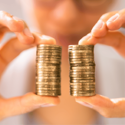 holding coins between thumb and forefinger