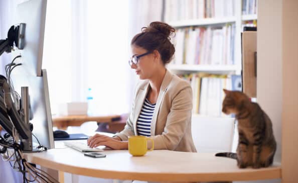 woman working from home as a remote worker vs. return to office